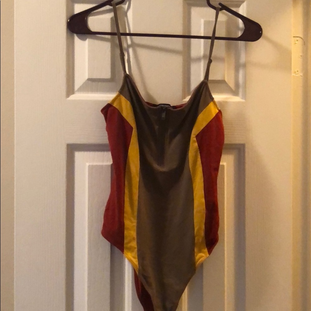 Olive, mustard, and dark red body suit